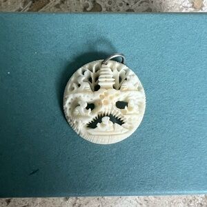 Carved Bone Pendant